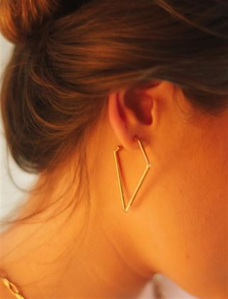 Guld øreringe tidløs skat i smykkeverdenen